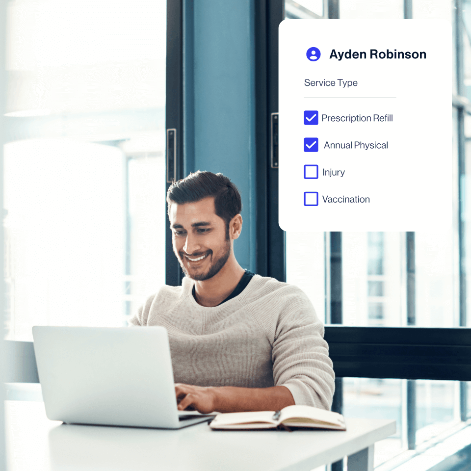 man on laptop at desk with service type option popup