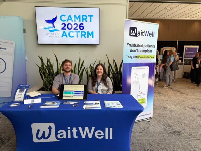 WaitWell team at healthcare conference